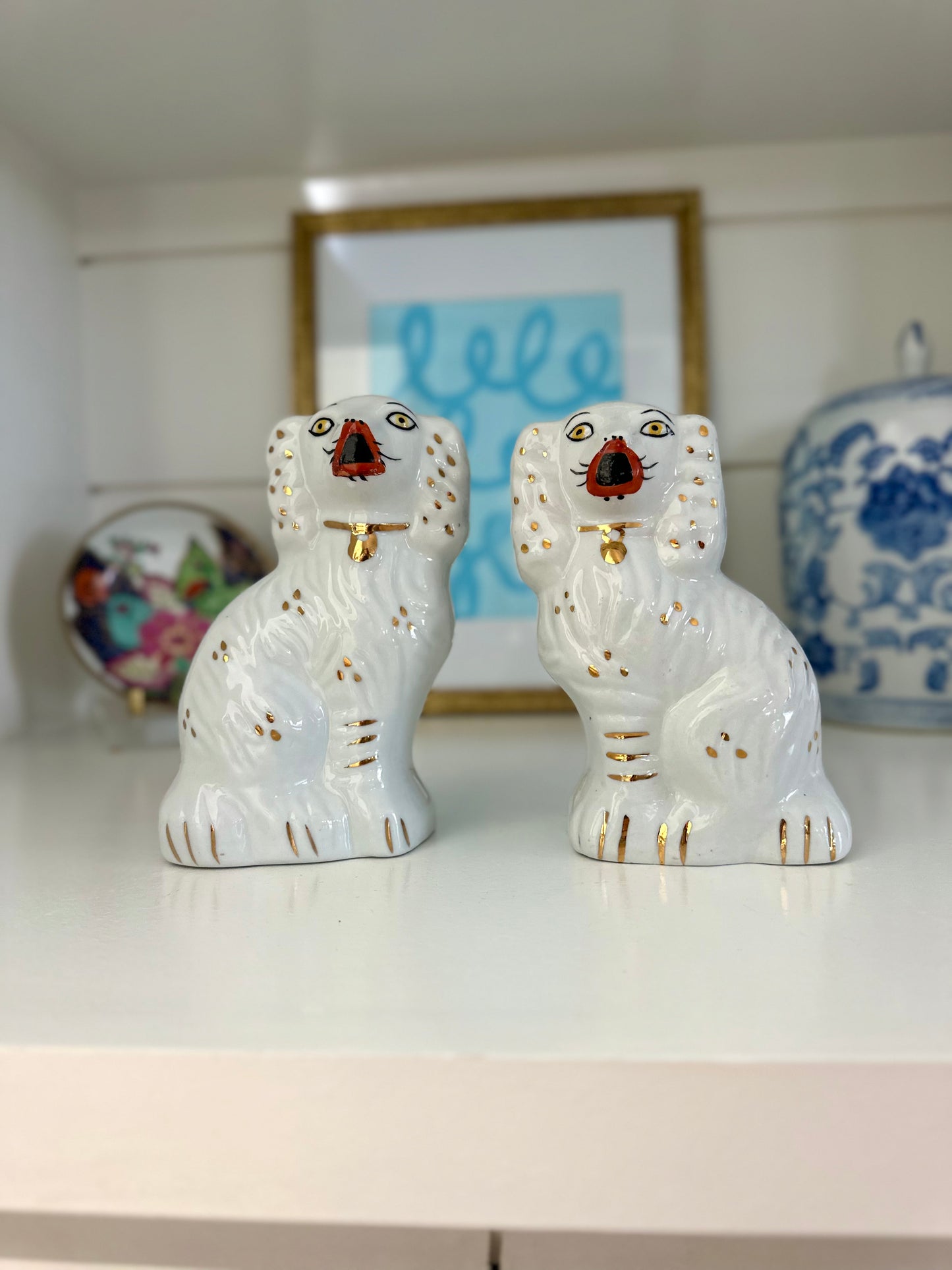 pair of reproduction Staffordshire mantel dogs