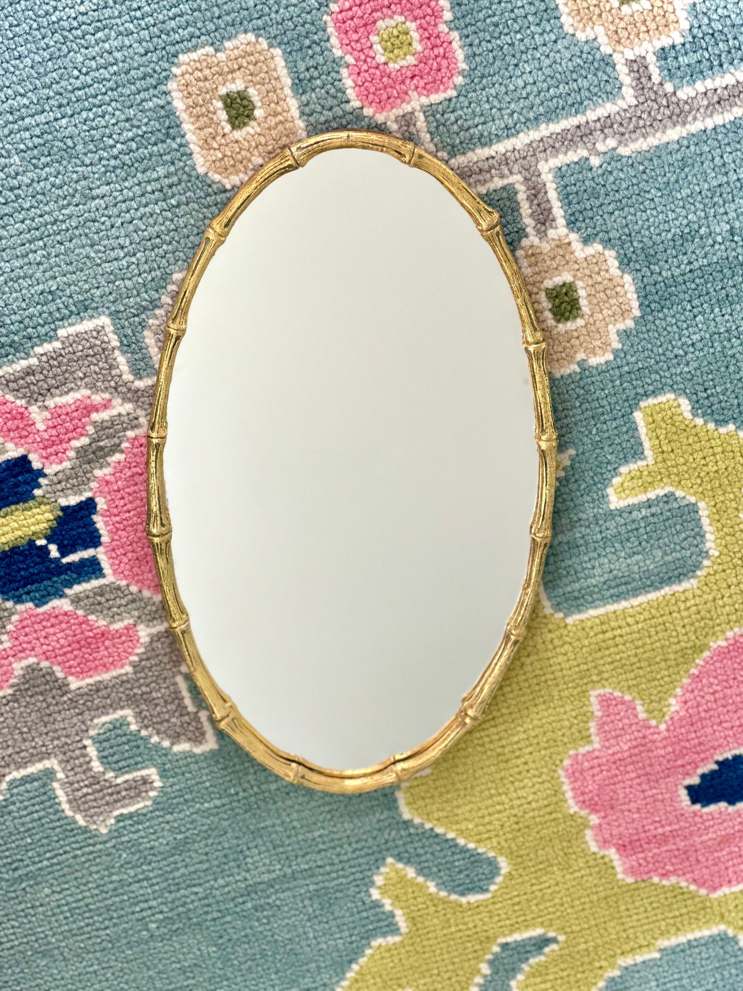 Bamboo trimmed gold mirror