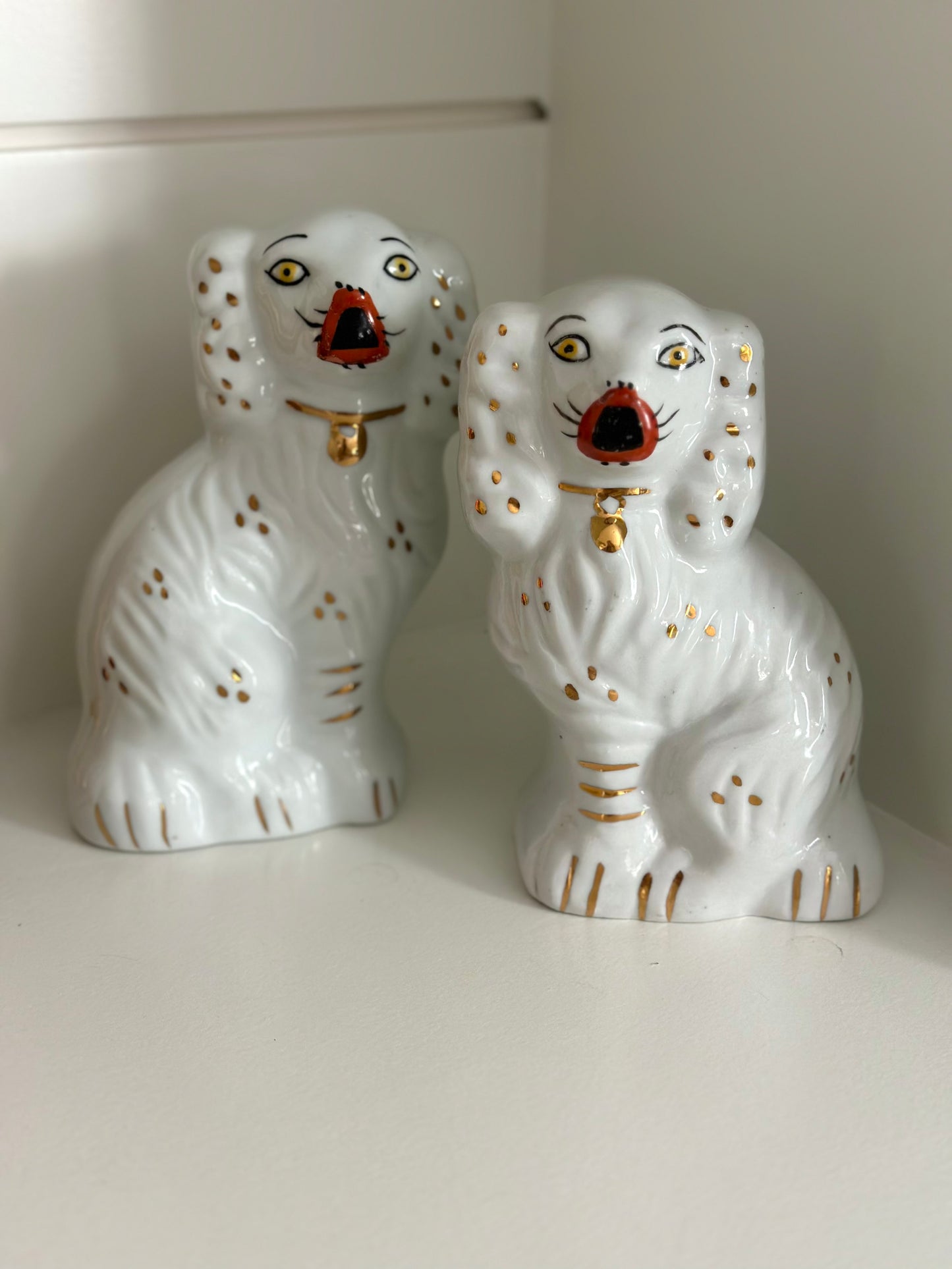pair of reproduction Staffordshire mantel dogs