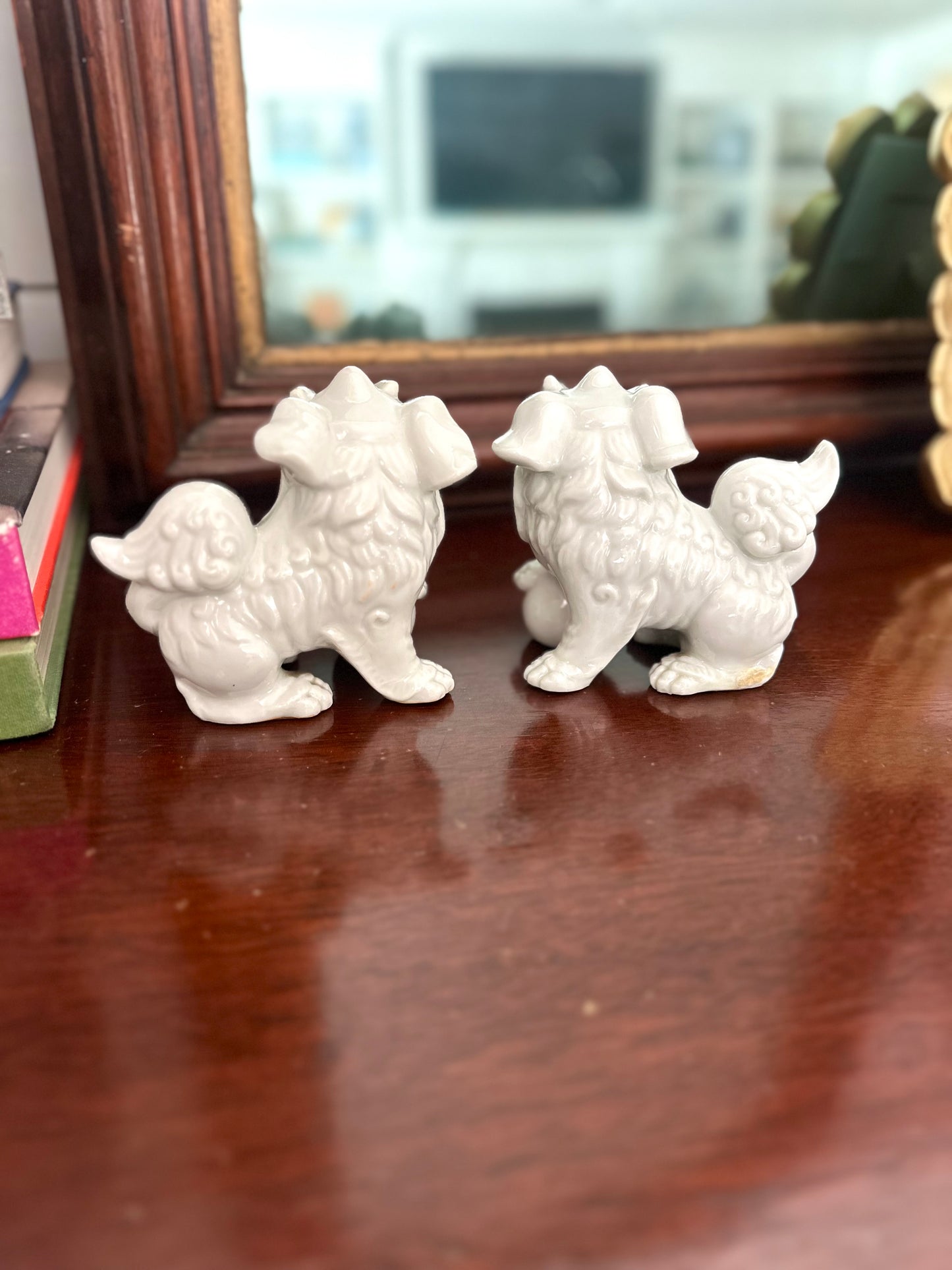 pair of vintage porcelain foo dogs