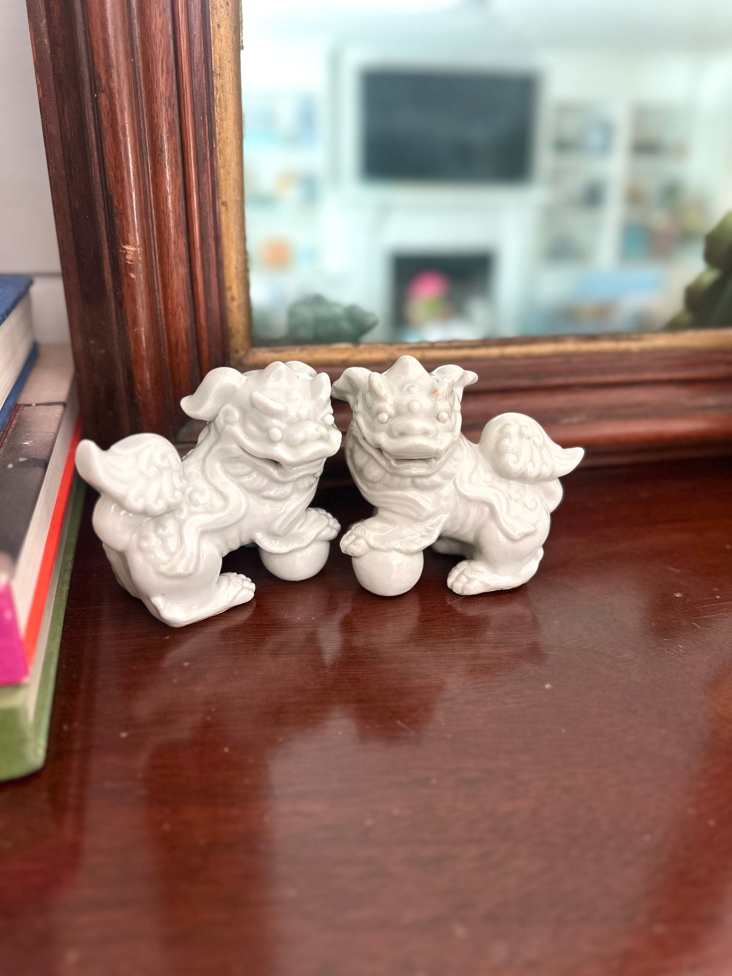 pair of vintage porcelain foo dogs